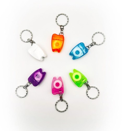 Nagrody dla dzielnych pacjentów gabinetów lekarskich: A152A - Brelok ząbek z nitką dentystyczną